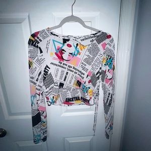 Graphic sheer long sleeved crop top